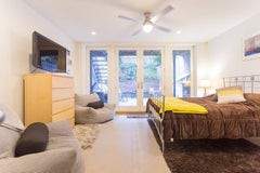 GARDEN SUITE IN TOWNHOUSE with SEMI-PRIVATE ENTRANCE.  <br />WE ARE SUPERHOSTS!  New York, NY Guest suite in New York · ★4.96 · 1 bedroom · 1 bed · 1 private bath Private room in guest suite vacation rental 10165064