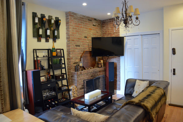 Turn-of-the-century elegance. Open living room with fireplace, 47
