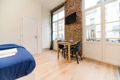 This warm and cosy red-bricked studio is located just a stone's throw from the w Ixelles, Belgium Cosy red-brick studio in the heart of Brussels Entire loft vacation rental 41831645