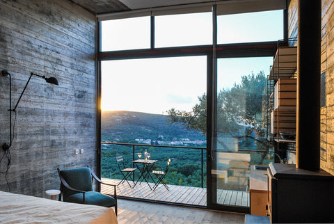 An artist and an art curator (Antonis and Sofia) created a unit of houses with a Chania, Greece Cabanon concrete retreat (house B) Tiny home vacation rental 27335505