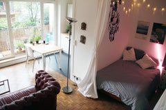 Studio calme et lumineux, cuisine équipée, accueillant et cosy, grande baie vitr Paris, France Charmant studio Canal de l'Ourq Entire rental unit vacation rental 3641648