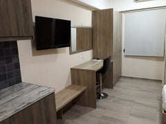 The Santo George Beach Hotel is located almost on the beach of Amoudara in Herak Heraklion, Greece Triple Studio on the Beach Private room in bed and breakfast vacation rental 44236688