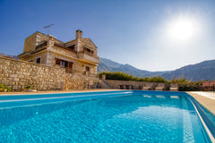 Made  completely of natural bright yellow stone,this location  offers you the li Kamatero, Greece Lake villas Entire villa vacation rental 7611136
