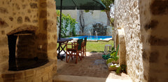 Discover our secret garden  with private pool, sunbeds and the waterfall ! A tra Rethimnon, Greece Madalo, old stone Home, with private pool Entire home vacation rental 31157991