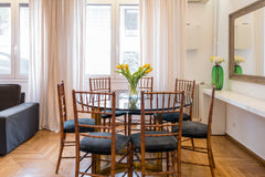 Pull back sheer curtains and push open a row of windows. Let fresh air and sunsh Berne, Canton of Bern, Switzerland Roomy Art-Filled Apartment in the Stylish Kolonaki Area Entire rental unit vacation rental 10817455