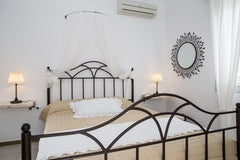 IRINI PENSION enjoys a privileged location in Platis Yialos, Sifnos. We are only  Deluxe Triple Room Private room in rental unit vacation rental 21749815