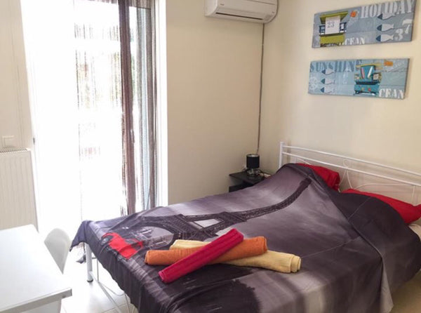 Each bedroom has a balcony, its own double bed, its own private wall-mount 40-in East Attica Regional Unit, Greece Luxury room central Athens metro Private room in rental unit vacation rental 33223592