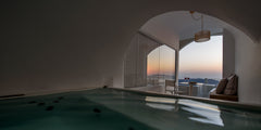 These charming suites are arranged with a bright living area, a separate bedroom Thera, Greece Nefeles Senior Suite with private outdoor hot tub Room in boutique hotel vacation rental 42878027