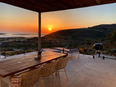 Set high above the Cycladic coastline and Palm beach, you will find a 2 bedroom   Sun House Paros Entire villa vacation rental 652853481948724084