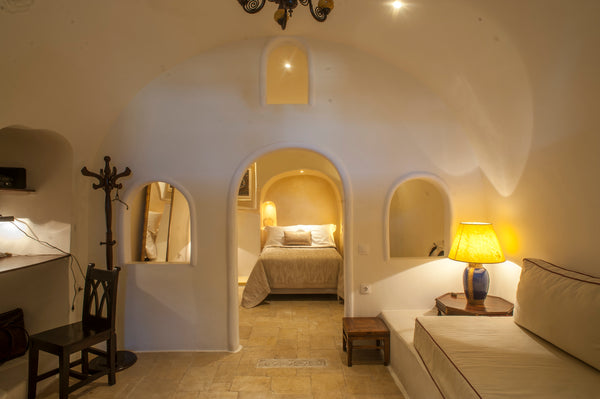 Open-plan, spacious suite with vaulted ceilings and dark-wood furnishings. It in  Heliophos Junior Suite Entire rental unit vacation rental 21602993