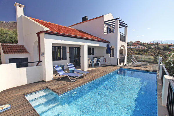 La villa Efthia  est située au centre du village de kokkino chorio avec son égli  Villa avec piscine et vue imprenable sur la mer Entire villa vacation rental 547659553700535271