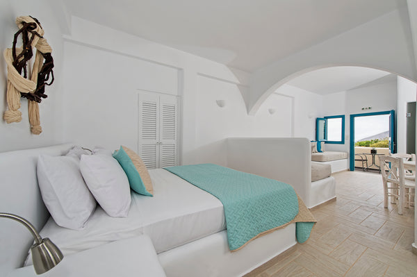 This suite features a bedroom with a white built-in bed, a modern hand-crafted b Greece Family Suite by Alizea Villas Room in hotel vacation rental 5795341
