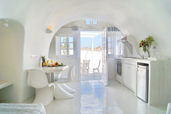 Cally Cave Family suite features bedroom area with queen size bed and bathroom,  Thera, Greece Cally Cave Grand Suite twin shared pool, near Fira Private room in serviced apartment vacation rental 44345208