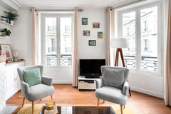 Live like a Parisian in this classic French-style flat. The home features a slig Paris, France Mid-Century Revival Apartment in Historic Building Entire rental unit vacation rental 23975113