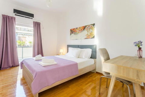 A bright, colorful apt with a balcony with great view of Acropolis, in one of At Athens, Greece Bright 2 bedrooms apt. in the heart of Athens w stunning views to Acropolis Entire rental unit vacation rental 543878153481300987
