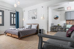 A fabulous suite with internal bath spa  to choose for your vacation in Santorin  Elegant Suite with Spa Bath By Ladas Pyrgos Room in serviced apartment vacation rental 38565725