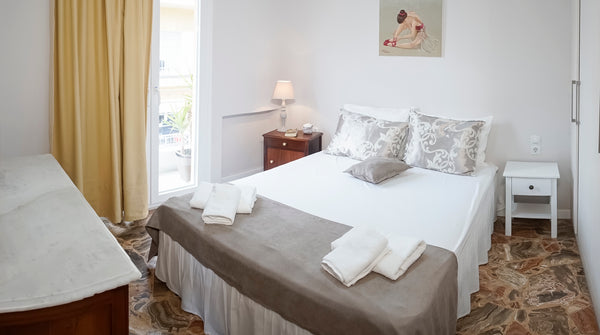 One room with double bed and a big living room with one sofa-bed. The apartment  Heraklion, Greece Heraklion Old Port Apartments (C3) Room in aparthotel vacation rental 19881451