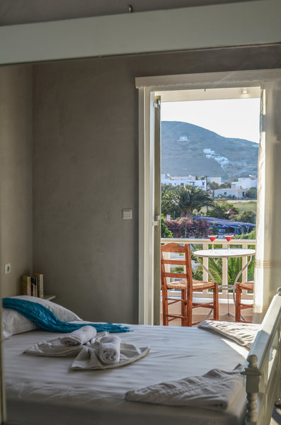 Olga's offers cycladic-style elegance, modern comfort (A/C, TV, WiFi) in a frien Ios, Greece Well-located friendly family hotel Private room in guesthouse vacation rental 8584023