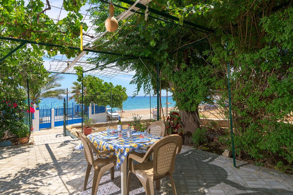 Family accommodation for four or three-member families, parents and two child Si Archangelos, Greece Garden Stegna Beach House Entire home vacation rental 31974250