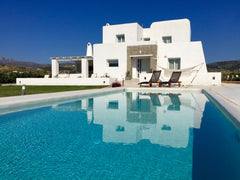 The villa is built on a 7000 s.m. land. the 240s.m of the house may accommodate  Greece Arya villa Cycladic home vacation rental 16419417