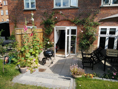 Newly renovated brick town house from 1900 with sun light all day. Located in qu Copenhagen, Denmark Spacious town house w. patio and small garden Entire condo vacation rental 1538345
