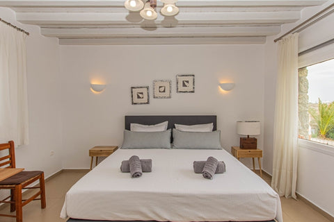 A cosy home 3 minutes from Mykono's Airport. <br />It can accommodate up to 3 pe Greece Triple Sea View Studio-2 km from the airport Cycladic home vacation rental 44054714