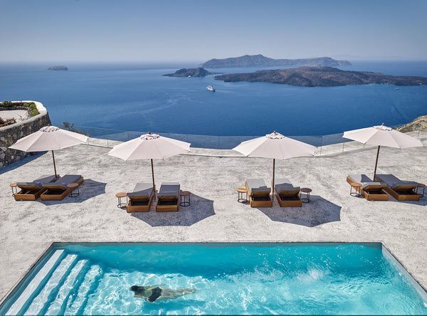 Reigning over the scenic Megalohori Caldera, Nafsika Estate offers awe-inspiring Greece Nafsika Estate Earthen home vacation rental 43512940