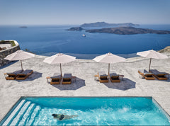 Reigning over the scenic Megalohori Caldera, Nafsika Estate offers awe-inspiring Greece Nafsika Estate Earthen home vacation rental 43512940