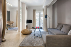 Share a bottle of wine on a fifth floor balcony as the sun sets behind an ancien Athens, Greece Apartment with an Acropolis View in the Historic City Center Entire condo vacation rental 15831118