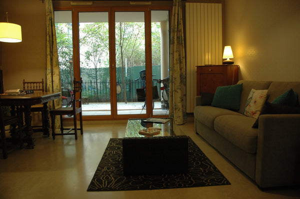 Bienvenue chez nous, dans un appartement en rez de jardin avec garage en plein c  appartement centre avec garage Entire rental unit vacation rental 8959672