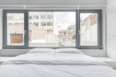 Marble-tiled walls and crisp, white fixtures elevate the open spaces of this mod Greece Gorgeous Minimalist Apartment in Central Athens Entire rental unit vacation rental 28555312