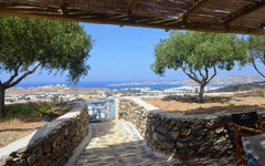 In an olive grove, with its thick stone walls, wooden arches, sea blue windows a Marousi, Greece GAEA of the ATLAS VILLAS complex , Paros, Greece Cycladic home vacation rental 13679884