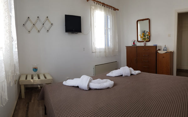 Hello. The small House is located in Exambela, a village very close to the cente  Guesthouse ' After the sunset' Cycladic home vacation rental 32833943
