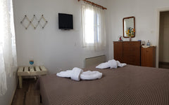 Hello. The small House is located in Exambela, a village very close to the cente  Guesthouse ' After the sunset' Cycladic home vacation rental 32833943