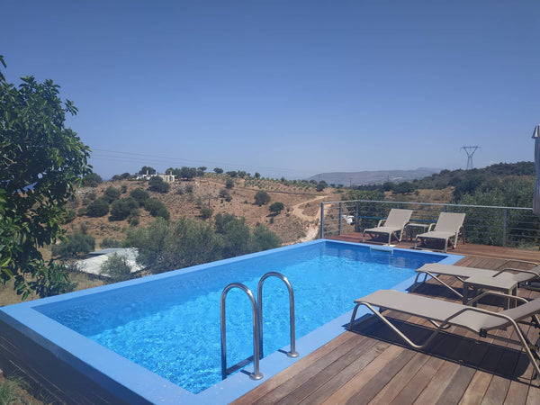 Enjoy your vacation on the beautiful island of Greece in a spacious villa with a  Spacious villa with pool and an amazing view! Entire villa vacation rental 668474773516043640