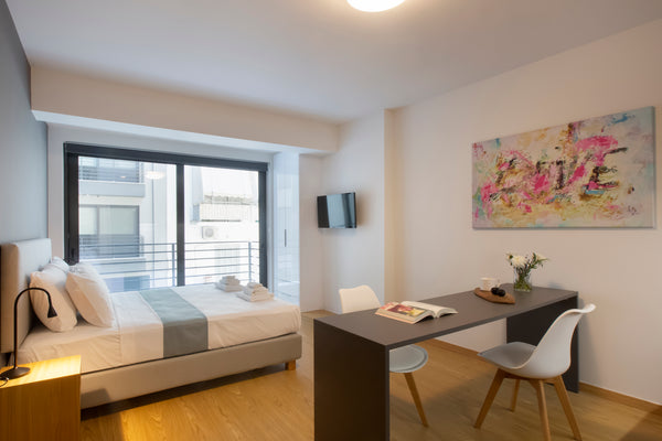 Classic Suite is 32 m2, accommodates up to 2 guests and has view to the patio an IE Classic Suites in Athens Panorama Project Entire serviced apartment vacation rental 50984915