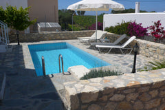Located in Loutra, this stylish villa with a sea view features 2 bedrooms for 4  Zürich, Switzerland Stylish Villa in Loutra with Private Pool, Garden near Seabeach Entire villa vacation rental 21697748