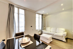 Living room : dining area, sitting area (sofa convertible in queen size bed). Fu Paris, France ID 238 Marais Saint Paul cosy flat Entire rental unit vacation rental 6873516