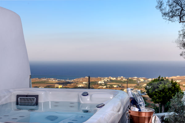 Opening to a furnished balcony with sea views, this suite features a private jet  Superior Suite with Sea View and Jetted Tub Room in hotel vacation rental 658401858631277414