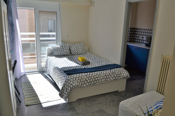 This minimal and cozy studio offers a beautiful space of 30 sqm & a terrace to e Athens, Greece A-04. Renovated 2019. Great studio.ACROPOLIS views Entire rental unit vacation rental 29541101