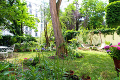 Appartement 3 pièces : chambre, salon et cuisine séparée, consciencieusement déc Paris, France Charmant appartement sur jardin Entire rental unit vacation rental 12693026