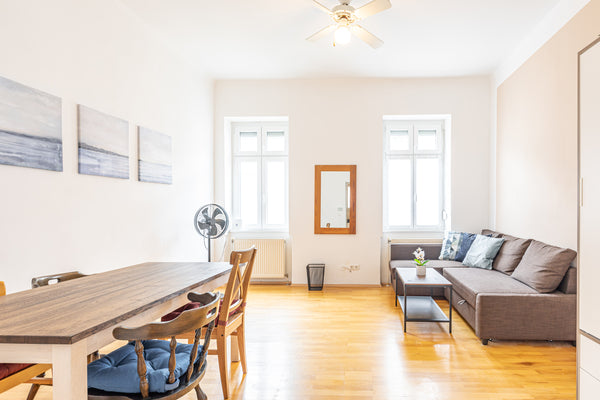 In this cozy apartment, there is a living room with a dining area, a bedroom wit Vienna, Austria CALM & COZY - Surrounded by parks & birdsongs Entire rental unit vacation rental 686676763235496823