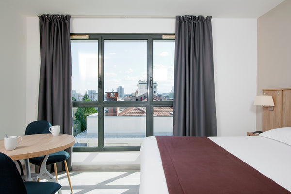 The Residhome Lyon Gerland aparthotel is ideally located in the Gerland business France Two-bedroom near Place Bellecour and Old Lyon Room in aparthotel vacation rental 47880385