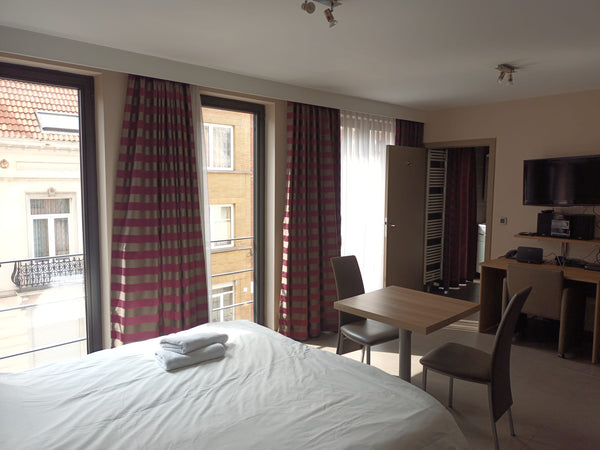 This amazing studio is located in a nice and calm neighborhood, within 850 meter Brussels, Belgium Studio Expo Center Entire rental unit vacation rental 660311780484378987