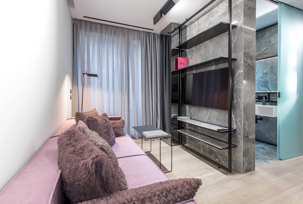 The suite has a comfortable living room with a 50'' TV , an elegantly decorated  CY The Duke suite 102/one bedroom Room in aparthotel vacation rental 38174172