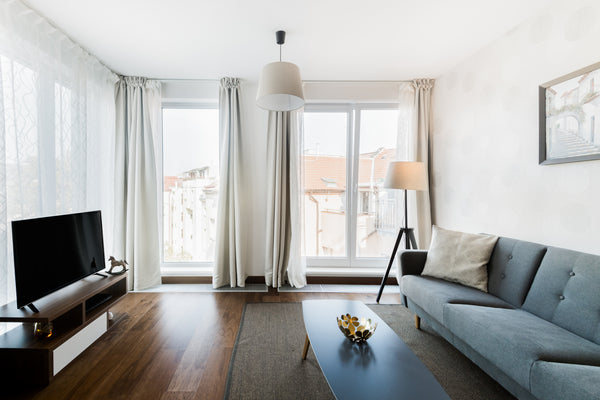 Start your day lounging on the modern couch as light spills through the floor-to Prague, Czechia Design Apartment with Garage Close to Metro and Old Town Entire rental unit vacation rental 21333902