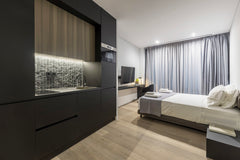 The suite has soft neutral palettes, a comfortable living room, a cozy bedroom a CY The Duke suite 201 (studio suite) Room in aparthotel vacation rental 38175360