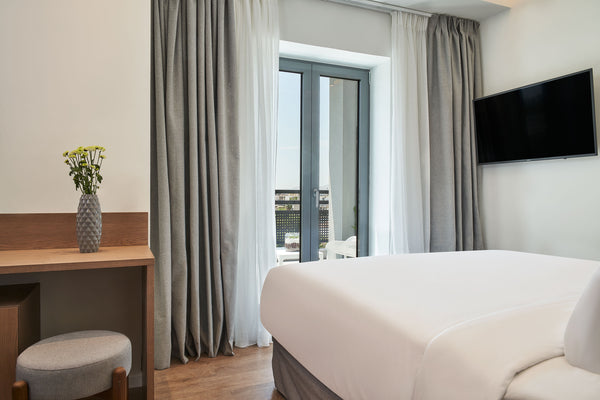 NLH KERAMEIKOS - Neighborhood Lifestyle Hotels features a fitness center and a b Athens, Greece NLH Kerameikos | Deluxe Double Room Room in hotel vacation rental 52273163