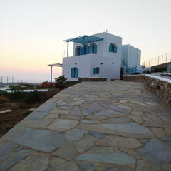 The house has a kitchen, living room, bathroom and a bedroom. In the bedroom the  Irini's apartment- Amorgos Cycladic home vacation rental 46559928