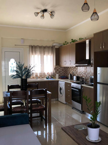 This brand new apartment is central to Kamari Bay. Easy access to the Beach, sea  Froso's House at Galini Family Taverna . Entire rental unit vacation rental 49972244